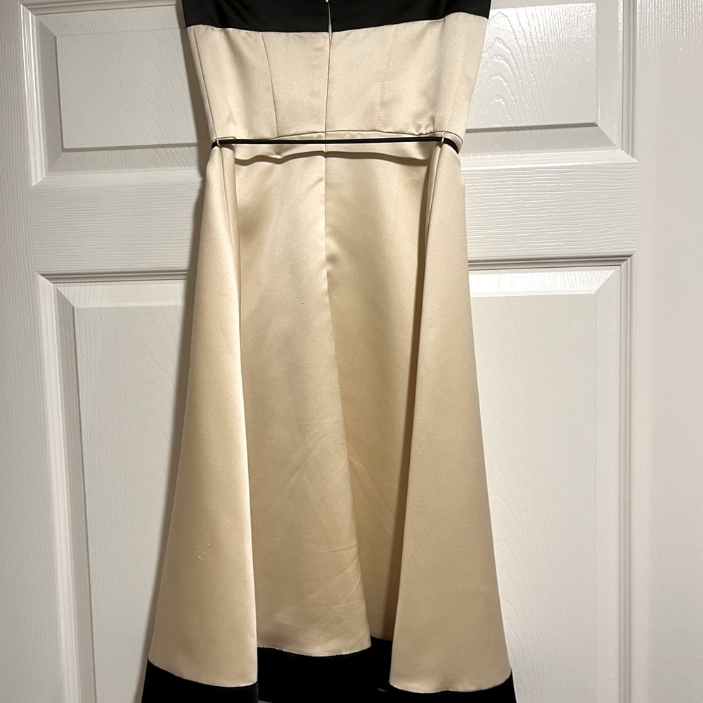 Ladies cream and black knee length dress. Size 0. Worn once